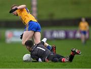 9 January 2022; Pádraig Pearses goalkeeper Paul Whelan fouls Aidan Orme of Knockmore, before being shown the black card and sent to the sin bin, during the AIB Connacht GAA Football Senior Club Championship Final match between Knockmore and Pádraig Pearses at James Stephens Park in Ballina, Mayo. Photo by Piaras Ó Mídheach/Sportsfile