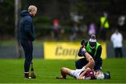 9 January 2022; Galway manager Henry Shefflin checks on his injured player Jason Flynn during the Walsh Cup Senior Hurling round 1 match between Galway and Offaly at Duggan Park in Ballinasloe, Galway. Photo by Harry Murphy/Sportsfile