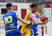 9 January 2022; Callum Russell of Killorglin CYMS in action against Ronan Byrne of UCD Marian during the Basketball Ireland Men's U20 Cup semi-final match between UCD Marian and Killorglin CYMS at Neptune Stadium in Cork. Photo by Brendan Moran/Sportsfile
