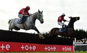 9 January 2022; Dunvegan, left, with Bryan Cooper up, jumps the last on their way to winning the Dan and Joan Moore Memorial Handicap Steeplechase, from second place Blackbow, right, with Paul Townend up, at Fairyhouse Racecourse in Ratoath, Meath. Photo by Seb Daly/Sportsfile