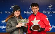 9 January 2022; Jodie Foley, daughter of winning owner representative Joe Foley, and jockey Bryan Cooper with their trophies after Dunvegan's victory in the Dan and Joan Moore Memorial Handicap Steeplechase at Fairyhouse Racecourse in Ratoath, Meath. Photo by Seb Daly/Sportsfile