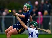 9 January 2022; Conor McDonald of Wexford is fouled by Sean Downey of Laois resulting in a penalty during the Walsh Cup Senior Hurling round 1 match between Laois and Wexford at Kelly Daly Park in Rathdowney, Laois. Photo by David Fitzgerald/Sportsfile