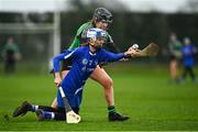 9 January 2022; Mary Geraghty of Raharney in action against Jessica Fitzell of Clanmaurice during the 2020 AIB All-Ireland Junior Club Camogie Championship Final match between Clanmaurice and Raharney at Moyne Templetuohy GAA Club in Templetuohy, Tipperary. Photo by Eóin Noonan/Sportsfile