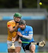 9 January 2022; Conal Bohill of Antrim is tackled by Ronán Smith of Dublin during the Walsh Cup Senior Hurling round 1 match between Dublin and Antrim at Parnell Park in Dublin. Photo by Ramsey Cardy/Sportsfile