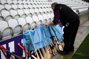 9 January 2022; Ballygunner's Muiris Phelan shelters the hurls before the AIB Munster Hurling Senior Club Championship Final match between Ballygunner and Kilmallock at Páirc Uí Chaoimh in Cork. Photo by Stephen McCarthy/Sportsfile