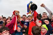 9 January 2022; Pádraig Pearses joint-captain Emmett Kelly holds the cup aloft during the celebrations after their side's victory in the AIB Connacht GAA Football Senior Club Championship Final match between Knockmore and Pádraig Pearses at James Stephens Park in Ballina, Mayo. Photo by Piaras Ó Mídheach/Sportsfile