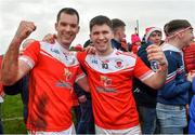 9 January 2022; Pádraig Pearses players Niall Carty, left, and Lorcán Daly celebrate after their side's victory in the AIB Connacht GAA Football Senior Club Championship Final match between Knockmore and Pádraig Pearses at James Stephens Park in Ballina, Mayo. Photo by Piaras Ó Mídheach/Sportsfile