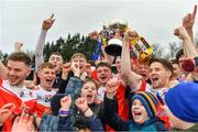 9 January 2022; Conor Lohan of Pádraig Pearses holds the cup aloft during the celebrations after his side's victory in the AIB Connacht GAA Football Senior Club Championship Final match between Knockmore and Pádraig Pearses at James Stephens Park in Ballina, Mayo. Photo by Piaras Ó Mídheach/Sportsfile