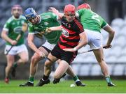 9 January 2022; Billy O'Keeffe of Ballygunner in action against Mark O'Loughlin, left, and Liam English of Kilmallock during the AIB Munster Hurling Senior Club Championship Final match between Ballygunner and Kilmallock at Páirc Uí Chaoimh in Cork. Photo by Stephen McCarthy/Sportsfile