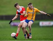 9 January 2022; Tom Butler of Pádraig Pearses in action against Seán Holmes of Knockmore during the AIB Connacht GAA Football Senior Club Championship Final match between Knockmore and Pádraig Pearses at James Stephens Park in Ballina, Mayo. Photo by Piaras Ó Mídheach/Sportsfile