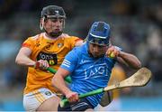 9 January 2022; Aidan Mellett of Dublin is tackled by Aaron Crawford of Antrim during the Walsh Cup Senior Hurling round 1 match between Dublin and Antrim at Parnell Park in Dublin. Photo by Ramsey Cardy/Sportsfile