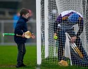 9 January 2022; Wexford supporter Jerry Connors, age 9, from Gorey, gets the match sliotar from Wexford goalkeeper Mark Fanning after the Walsh Cup Senior Hurling round 1 match between Laois and Wexford at Kelly Daly Park in Rathdowney, Laois. Photo by David Fitzgerald/Sportsfile