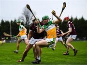 9 January 2022; Brian Duignan of Offaly in action against Gearoid McInerney of Galway during the Walsh Cup Senior Hurling round 1 match between Galway and Offaly at Duggan Park in Ballinasloe, Galway. Photo by Harry Murphy/Sportsfile