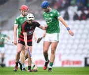 9 January 2022; Dessie Hutchinson of Ballygunner pushes Philip O'Loughlin of Kilmallock away from his boot during the AIB Munster Hurling Senior Club Championship Final match between Ballygunner and Kilmallock at Páirc Uí Chaoimh in Cork. Photo by Stephen McCarthy/Sportsfile