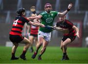 9 January 2022; Paudie O'Brien of Kilmallock in action against Tadhg Foley, left, and Billy O'Keeffe of Ballygunner during the AIB Munster Hurling Senior Club Championship Final match between Ballygunner and Kilmallock at Páirc Uí Chaoimh in Cork. Photo by Stephen McCarthy/Sportsfile