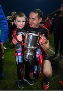 9 January 2022; Shane O'Sullivan of Ballygunner and his son, Ferdia, celebrate with the cup after the AIB Munster Hurling Senior Club Championship Final match between Ballygunner and Kilmallock at Páirc Uí Chaoimh in Cork. Photo by Stephen McCarthy/Sportsfile