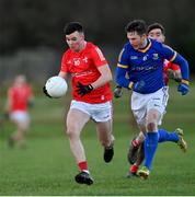 8 January 2022; Liam Jackson of Louth and Michael Quinn of Longford during the O'Byrne Cup group A match between Longford and Louth at Rathcline GAA club in Lanesboro, Longford. Photo by Ramsey Cardy/Sportsfile