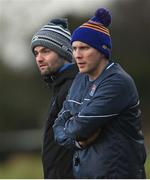 8 January 2022; Longford manager Billy O'Loughlin, left, and coach Michael Hannon during the O'Byrne Cup group A match between Longford and Louth at Rathcline GAA club in Lanesboro, Longford. Photo by Ramsey Cardy/Sportsfile