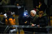 11 January 2022; A supporter with a headlight watches the game from the stands during the McGrath Cup Group A match between Cork and Waterford at Páirc Uí Rinn in Cork. Photo by Eóin Noonan/Sportsfile