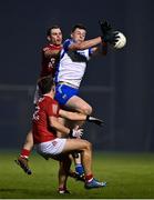 11 January 2022; Michael Curry of Waterford in action against Matthew Taylor of Cork during the McGrath Cup Group A match between Cork and Waterford at Páirc Uí Rinn in Cork. Photo by Eóin Noonan/Sportsfile