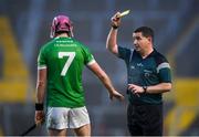 9 January 2022; Paudie O'Brien of Kilmallock is shown a yellow card by referee Colm Lyons during the AIB Munster Hurling Senior Club Championship Final match between Ballygunner and Kilmallock at Páirc Uí Chaoimh in Cork. Photo by Stephen McCarthy/Sportsfile