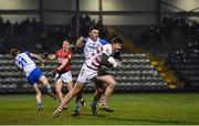 11 January 2022; Joe Creedon of Cork is tackled by Darragh Corcoran of Waterford during the McGrath Cup Group A match between Cork and Waterford at Páirc Uí Rinn in Cork. Photo by Eóin Noonan/Sportsfile