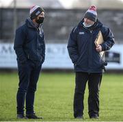 8 January 2022; Cork County Board secretary Kevin O'Donovan, left, and Cork manager Keith Ricken before the the McGrath Cup group A match between Clare and Cork at Hennessy Memorial Park in Miltown Malbay, Clare. Photo by Stephen McCarthy/Sportsfile