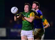 12 January 2022; Paudie Clifford of Kerry is tackled by Jimmy Feehan of Tipperary during the McGrath Cup Group B match between Tipperary and Kerry at Moyne Templetuohy GAA Club in Templetuohy, Tipperary. Photo by Brendan Moran/Sportsfile