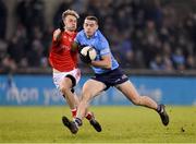 12 January 2022; Brian Fenton of Dublin in action against Leonard Grey of Louth during the O'Byrne Cup Group A match between Dublin and Louth at Parnell Park in Dublin. Photo by Stephen McCarthy/Sportsfile