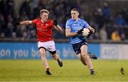 12 January 2022; Brian Fenton of Dublin in action against Leonard Grey of Louth during the O'Byrne Cup Group A match between Dublin and Louth at Parnell Park in Dublin. Photo by Stephen McCarthy/Sportsfile