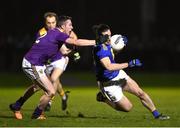 12 January 2022; Paul Cunningham of Wicklow in action against Graham Staples of Wexford during the O'Byrne Cup Group B match between Wicklow and Wexford at Bray Emmets GAA Club in Bray, Wicklow. Photo by Harry Murphy/Sportsfile