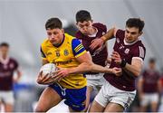 14 January 2022; Conor Cox of Roscommon in action against Cillian McDaid, right, and Johnny Heaney of Galway during the Connacht FBD League Final match between Galway and Roscommon at NUI Galway Connacht Air Dome in Bekan, Mayo. Photo by Sam Barnes/Sportsfile