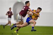 14 January 2022; Cathal Heneghan of Roscommon in action against Finnian Ó Laoi of Galway during the Connacht FBD League Final match between Galway and Roscommon at NUI Galway Connacht Air Dome in Bekan, Mayo. Photo by Sam Barnes/Sportsfile