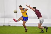 14 January 2022; Ultan Harney of Roscommon in action against Owen Gallagher of Galway during the Connacht FBD League Final match between Galway and Roscommon at NUI Galway Connacht Air Dome in Bekan, Mayo. Photo by Sam Barnes/Sportsfile