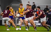 14 January 2022; Diarmuid McGann of Roscommon in action against Galway players, from left, Seán Fitzgerald, Paul Conroy, Dylan McHugh and Cillian McDaid during the Connacht FBD League Final match between Galway and Roscommon at NUI Galway Connacht Air Dome in Bekan, Mayo. Photo by Sam Barnes/Sportsfile