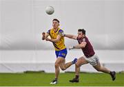 14 January 2022; Ciaran Lawless of Roscommon in action against Dessie Conneely of Galway during the Connacht FBD League Final match between Galway and Roscommon at NUI Galway Connacht Air Dome in Bekan, Mayo. Photo by Sam Barnes/Sportsfile