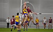 14 January 2022; Players from both sides contest a high ball during the Connacht FBD League Final match between Galway and Roscommon at NUI Galway Connacht Air Dome in Bekan, Mayo. Photo by Sam Barnes/Sportsfile