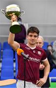 14 January 2022; Seán Kelly of Galway lifts the Paddy Francis Dwyer Cup after his side's victory in the Connacht FBD League Final match between Galway and Roscommon at NUI Galway Connacht Air Dome in Bekan, Mayo. Photo by Sam Barnes/Sportsfile