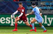 14 January 2022; Jack Crowley of Munster in action against Thomas Combezou of Castres Olympique during the Heineken Champions Cup Pool B match between Castres Olympique and Munster at Stade Pierre Fabre in Castres, France. Photo by Manuel Blondeu/Sportsfile