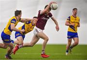 14 January 2022; Patrick Kelly of Galway in action against Shane Cunnane, left, and Aengus Lyons of Roscommon during the Connacht FBD League Final match between Galway and Roscommon at NUI Galway Connacht Air Dome in Bekan, Mayo. Photo by Sam Barnes/Sportsfile