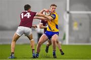 14 January 2022; Eoin McCormack of Roscommon in action against Robert Finnerty of Galway during the Connacht FBD League Final match between Galway and Roscommon at NUI Galway Connacht Air Dome in Bekan, Mayo. Photo by Sam Barnes/Sportsfile