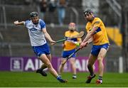 15 January 2022; Cathal Malone of Clare in action against DJ Foran of Waterford during the 2022 Co-op Superstores Munster Hurling Cup Semi-Final match between Clare and Waterford at Cusack Park in Ennis, Clare. Photo by Sam Barnes/Sportsfile