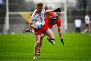 15 January 2022; Nathan Donnelly of Tyrone in action against Ciaron O'Hanlon of Armagh during the Dr McKenna Cup Round 3 match between Tyrone and Armagh at O’Neill’s Healy Park in Omagh, Tyrone. Photo by David Fitzgerald/Sportsfile