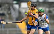 15 January 2022; Cathal Malone of Clare in action against Tom Barron of Waterford during the 2022 Co-op Superstores Munster Hurling Cup Semi-Final match between Clare and Waterford at Cusack Park in Ennis, Clare. Photo by Sam Barnes/Sportsfile