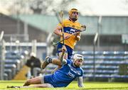 15 January 2022; Mark Rodgers of Clare after scoring his side's first goal past Waterford goalkeeper Shaun O'Brien during the 2022 Co-op Superstores Munster Hurling Cup Semi-Final match between Clare and Waterford at Cusack Park in Ennis, Clare. Photo by Sam Barnes/Sportsfile