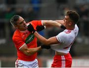 15 January 2022; Mark Shields of Armagh and Conn Kilpatrick of Tyrone tussle during the Dr McKenna Cup Round 3 match between Tyrone and Armagh at O’Neill’s Healy Park in Omagh, Tyrone. Photo by David Fitzgerald/Sportsfile