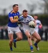 15 January 2022; Cathal Fennessy of Laois in action against Niall Donnelly of Wicklow during the O'Byrne Cup Group B match between Laois and Wicklow at Crettyard GAA Club in Laois. Photo by Daire Brennan/Sportsfile