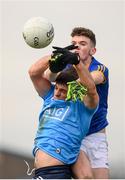 15 January 2022; Brian Howard of Dublin in action against Keelin McGann of Longford during the O'Byrne Cup Group A match between Longford and Dublin at Glennon Brothers Pearse Park in Longford. Photo by Stephen McCarthy/Sportsfile