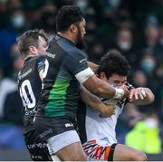 15 January 2022; Kini Murimurivalu of Leicester Tigers is tackled by Jack Carty and Bundee Aki of Connacht during the Heineken Champions Cup Pool B match between Connacht and Leicester Tigers at The Sportsground in Galway. Photo by Brendan Moran/Sportsfile