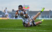 15 January 2022; Kini Murimurivalu of Leicester Tigers scores his side's second try despite the tackle of Tiernan O’Halloran of Connacht during the Heineken Champions Cup Pool B match between Connacht and Leicester Tigers at The Sportsground in Galway. Photo by Brendan Moran/Sportsfile